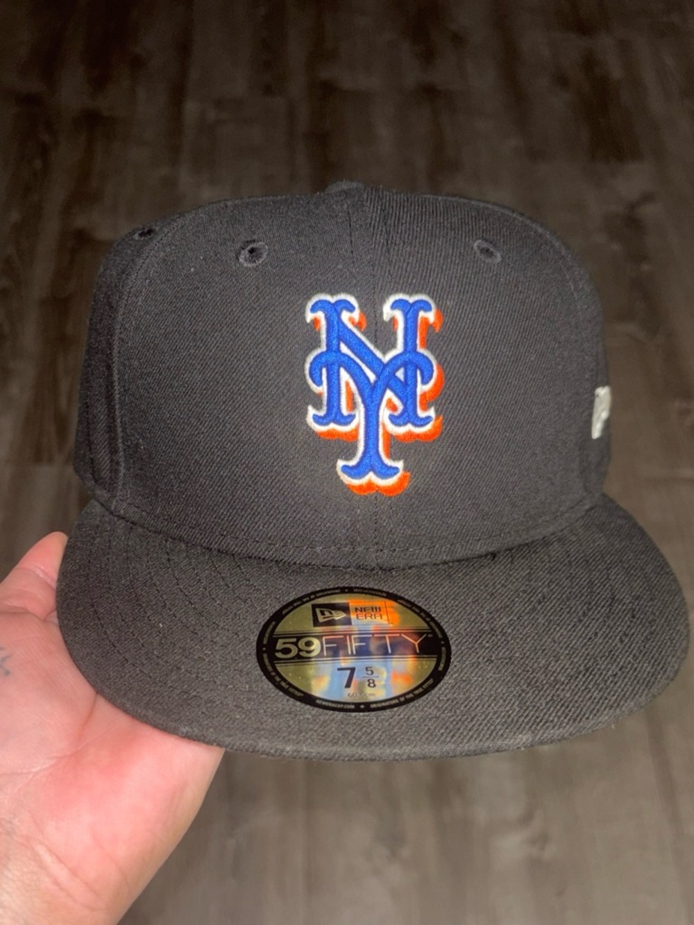 New Era Black New York Mets Fitted Cap with Blue & Orange NY Logo